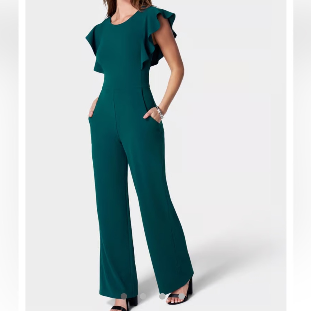 Bebe green jumpsuit in size XL. Never worn (I was too short)